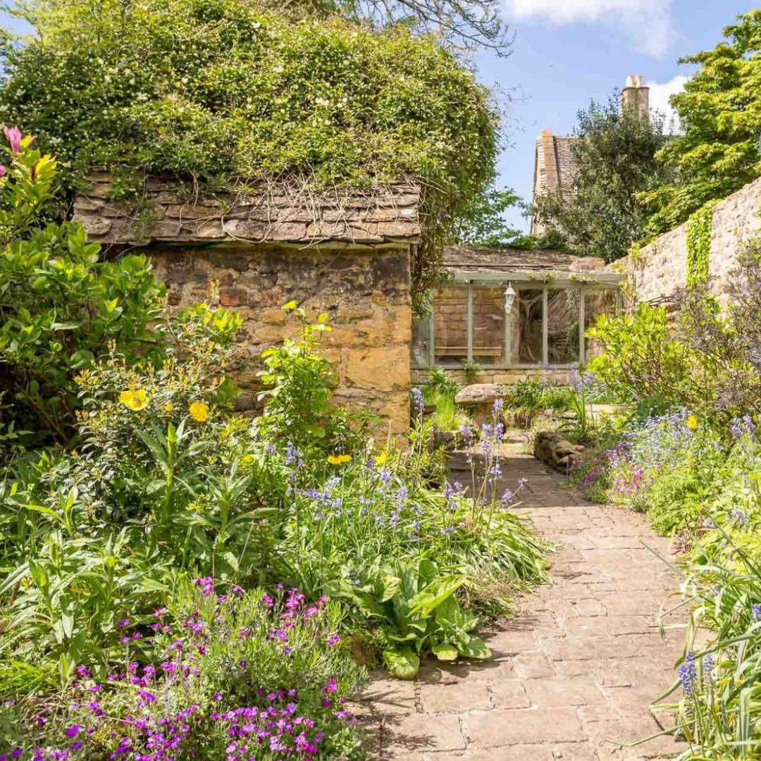 Terraced garden at Stanley Cottage - a charming Cotswolds cottage vacation rental.