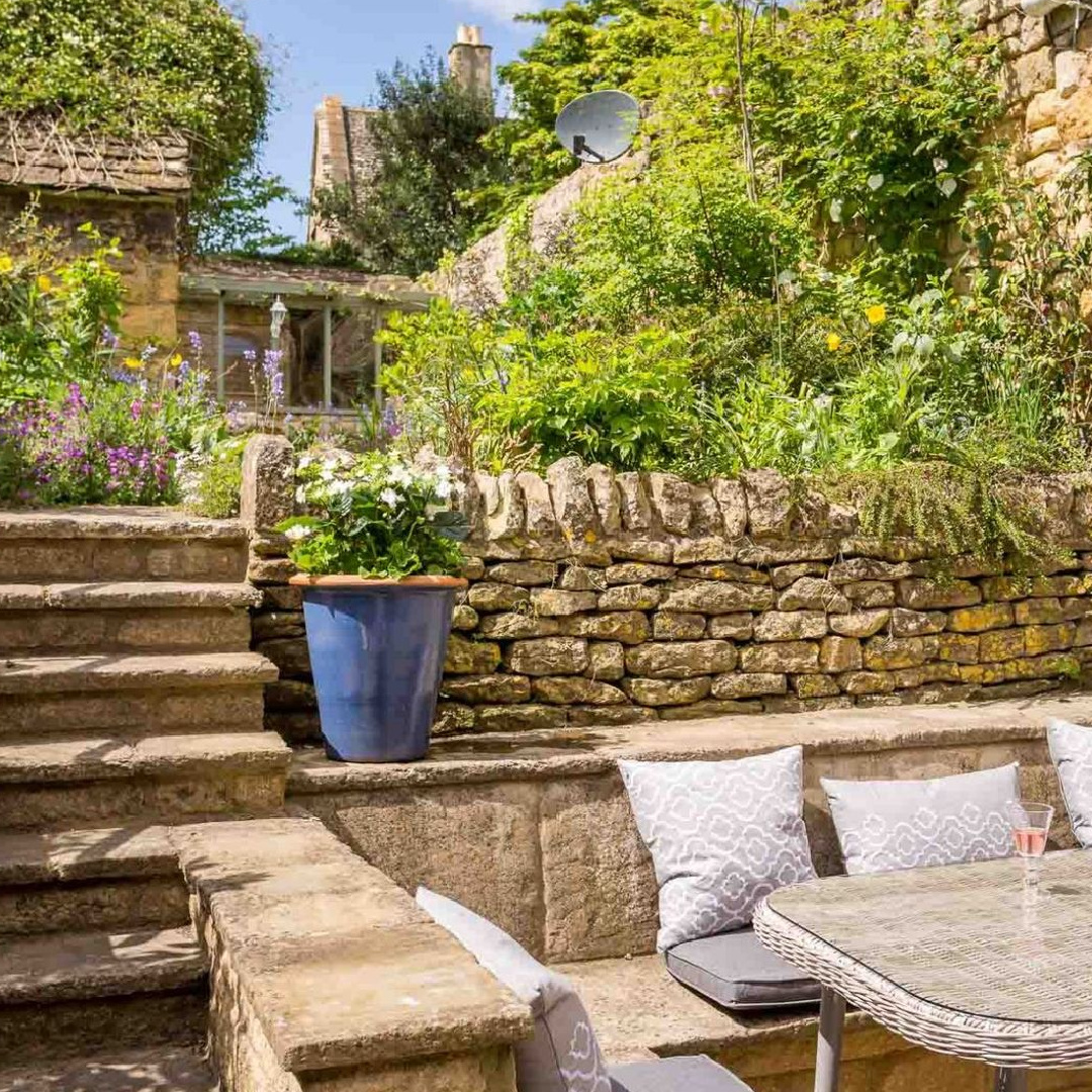 Terraced garden at Stanley Cottage - a charming Cotswold cottage vacation rental.