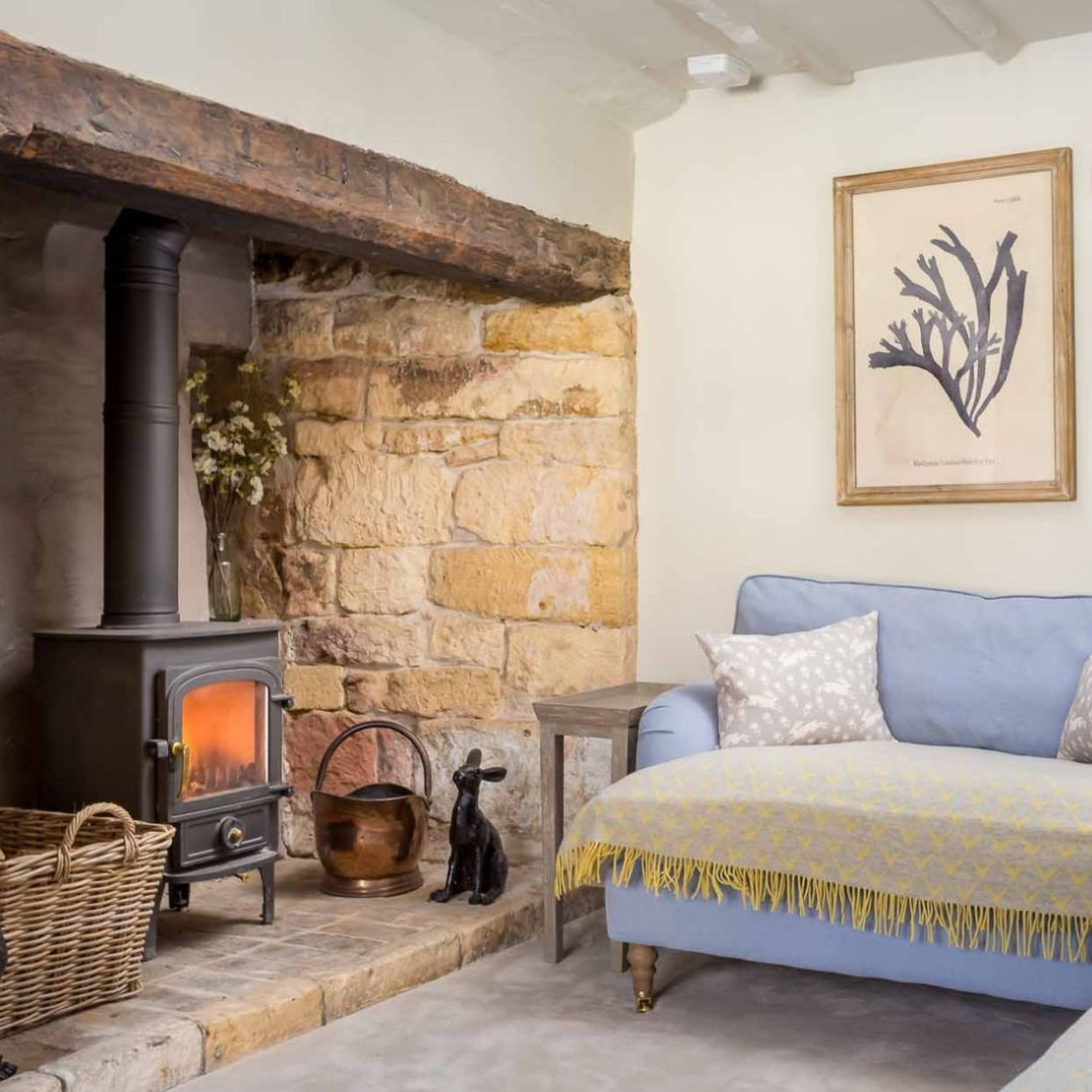 Fireplace in living room of Stanley Cottage (Chipping Campden) - a charming Cotswolds cottage.