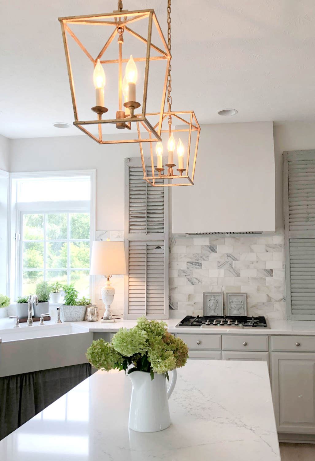 Progress on our kitchen renovation where we added Viatera Muse quartz and calacatta gold marble subway tile.