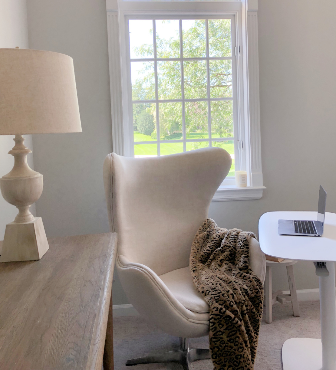 Hello Lovely's BDI Soma Lift Desk and egg chair in serene den with Belgian style. #adjustabledesk #homeoffice #belgianstyle