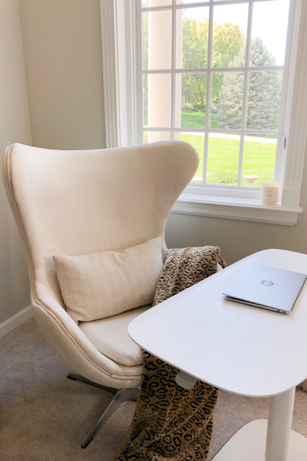 Hello Lovely's BDI Soma Lift Desk and egg chair in serene den with Belgian style. #adjustabledesk #homeoffice #belgianstyle