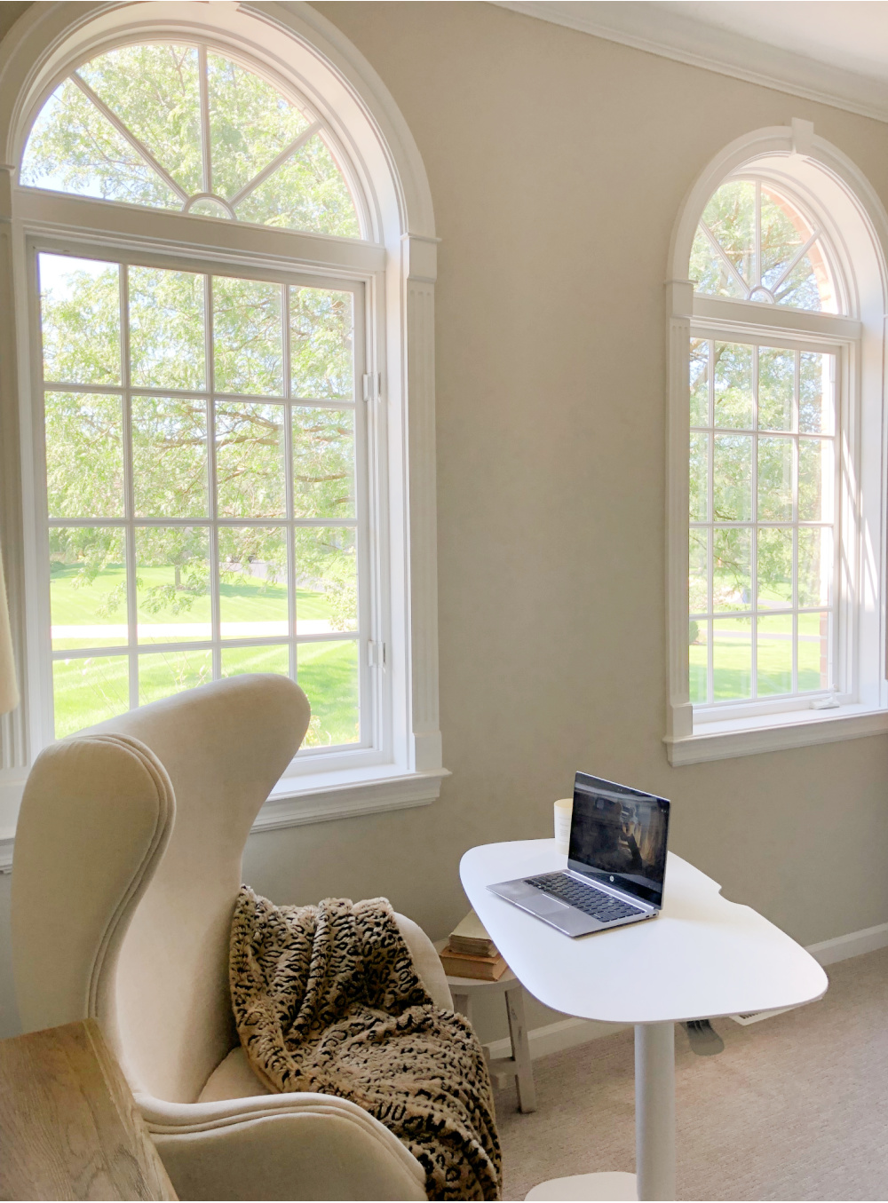 Hello Lovely's BDI Soma Lift Desk and egg chair in serene den with Belgian style. #adjustabledesk #homeoffice #belgianstyle