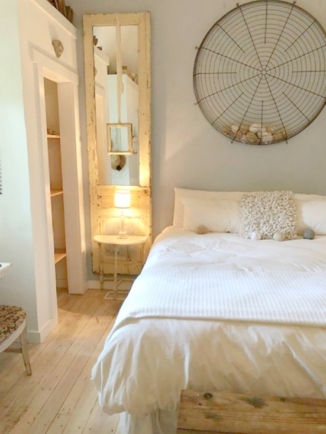 Rustic bedroom in country cottage in Leiper's Fork, TN known as storybook cottage - Hello Lovely Studio.