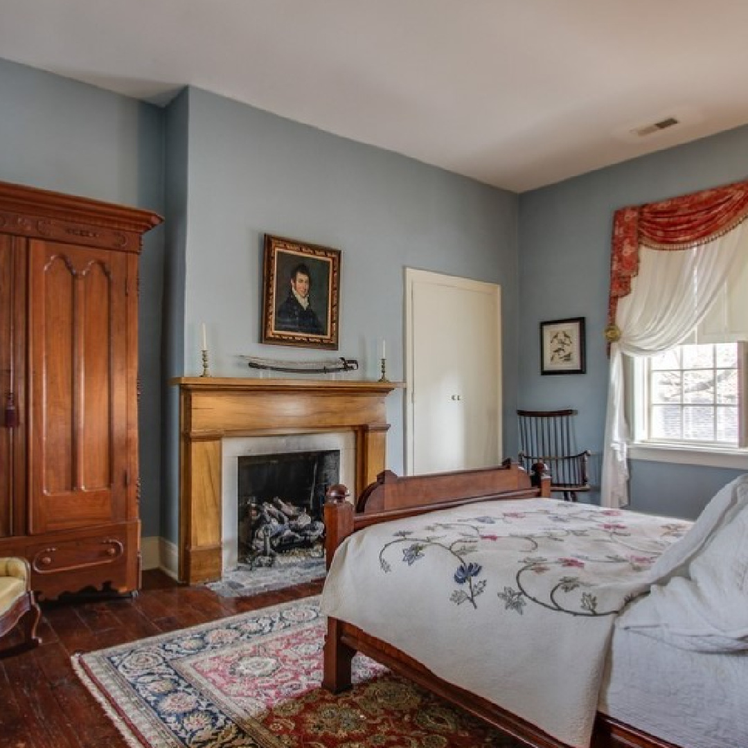 Blue bedroom with fireplace in 1810 restored home - 3200 Del Rio Pike in Franklin - Meeting of the Waters house. #historichomes #franklintn