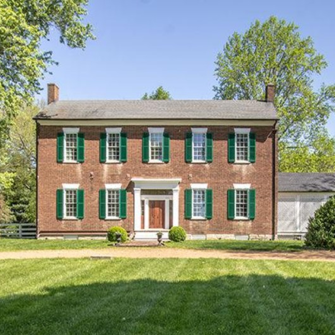 Red brick exterior of 1810 restored home -