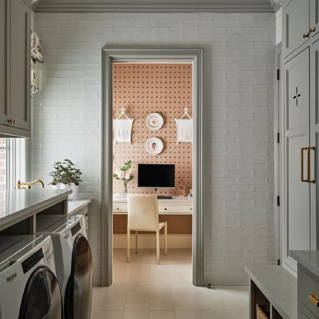 Purbeck Stone (Farrow & Ball) painted cabinetry in beautifully designed laundry room by @torirubinsoninteriors. 