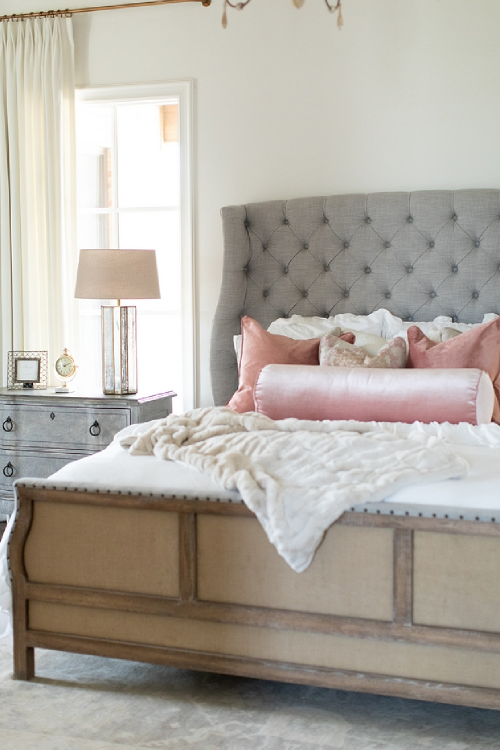 Beautiful deconstructed Boheme bed with tufted wing headboard (Hooker Furniture) in a modern French bedroom by Brittany Jones. #modernfrench #frenchcountrybedroom