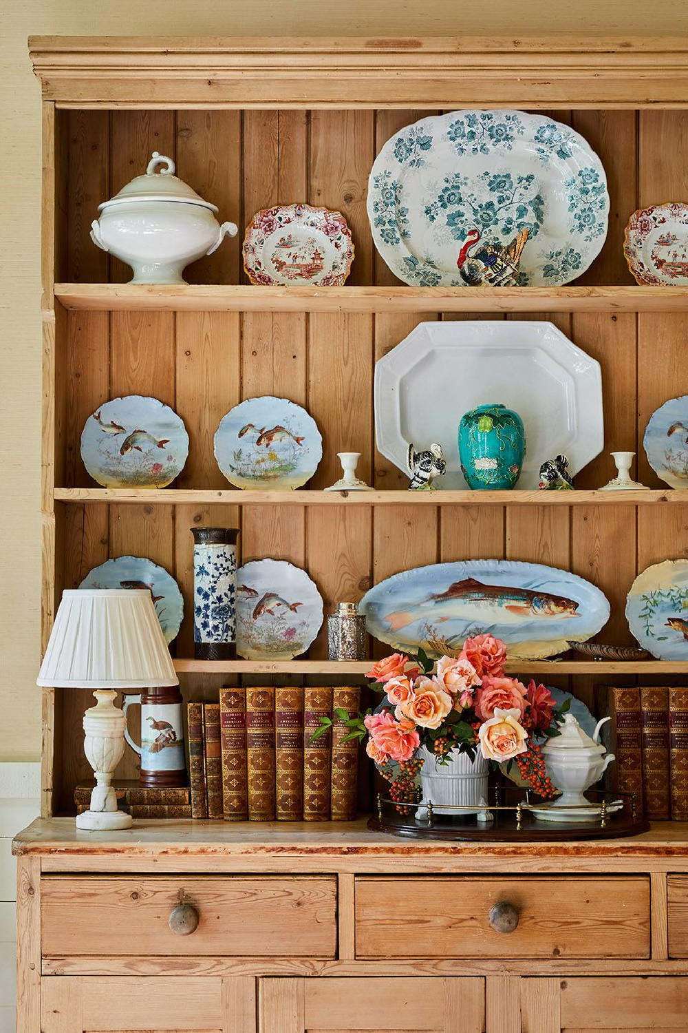 Treasured ironstone and china in dining room cupboard of James Farmer - from CELEBRATING HOME (Gibbs Smith, 2022). #southernhomeinterior