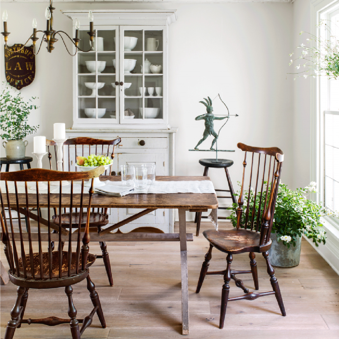 Dining room in Nancy Fishelson's renovated historic home in Killingworth - Country Living magazine/Helen Norman/Janna Lufkin.