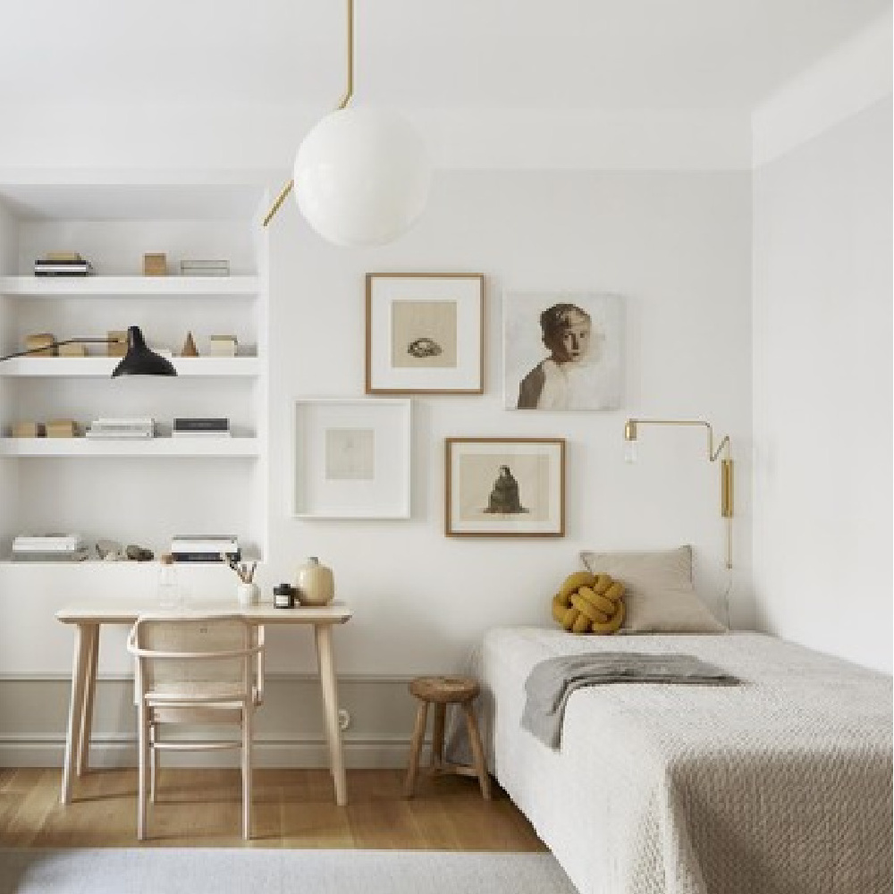 Lovely serene Stockholm apartment bedroom with muted quiet colors of light grey and white and modern Scandi design - Frantastic Frank. #scandinavian #interiordesign #stockholmapartmet #bedroomdesign #bedroomdecor