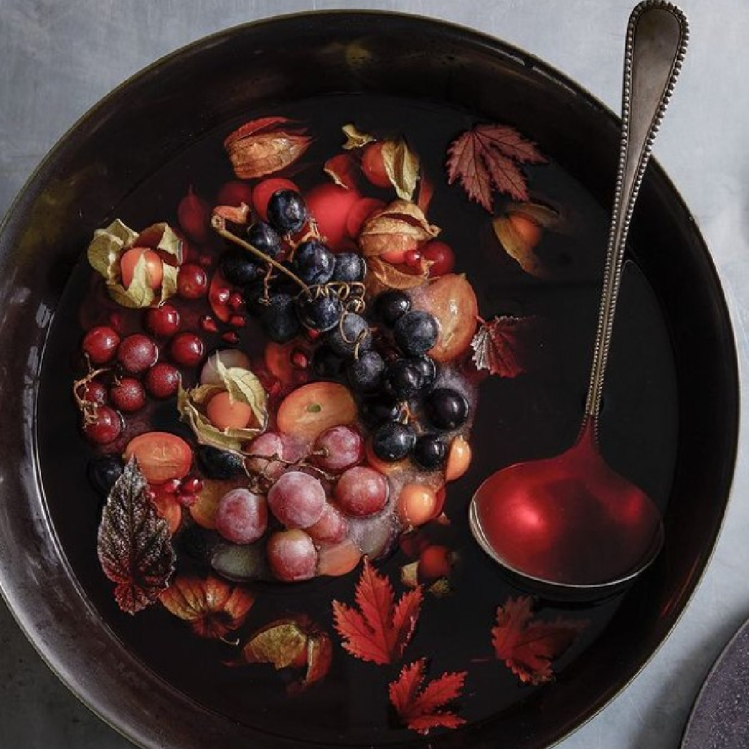 Frozen fruit floating in a fall punch - Martha Stewart (photo by Addie Juell). #falltable #fallpunch