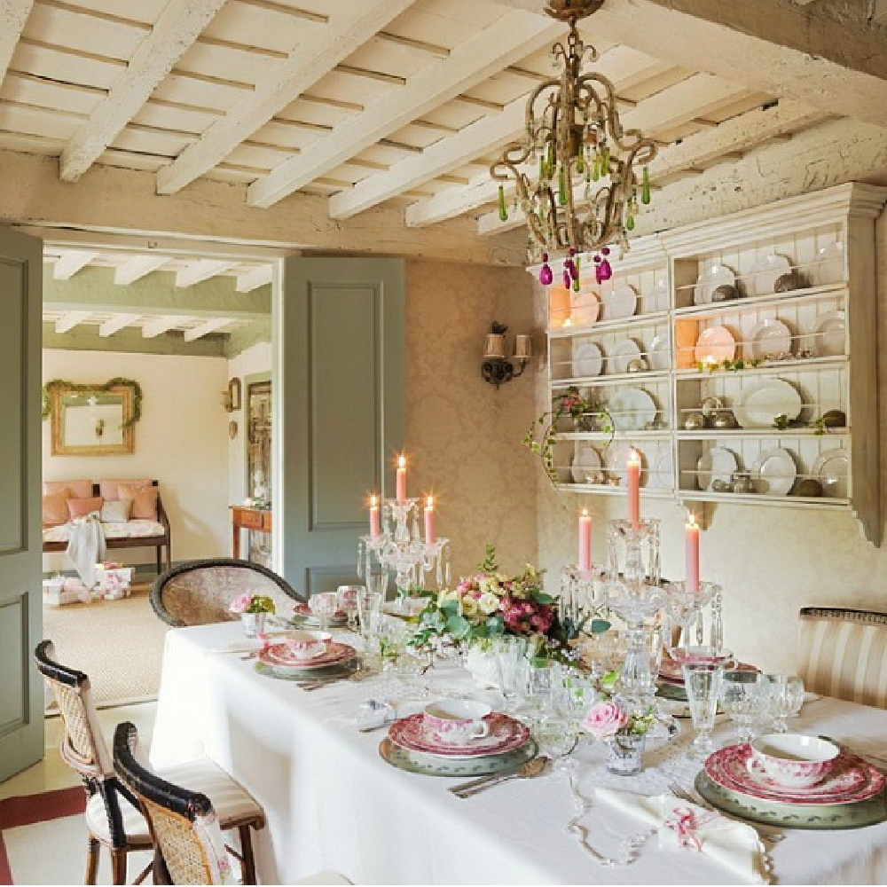Dining room in a romantic french country cottage. Come be inspired by interior design photos with French Green Paint Colors and Serene French Blue-Greens. #greenpaintcolors #mintgreen #interiordesign #paint