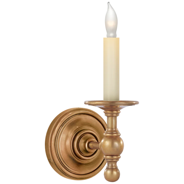 Visual comfort candle sconce in hand rubbed antique brass. #wallsconce #chapmanandmeyers