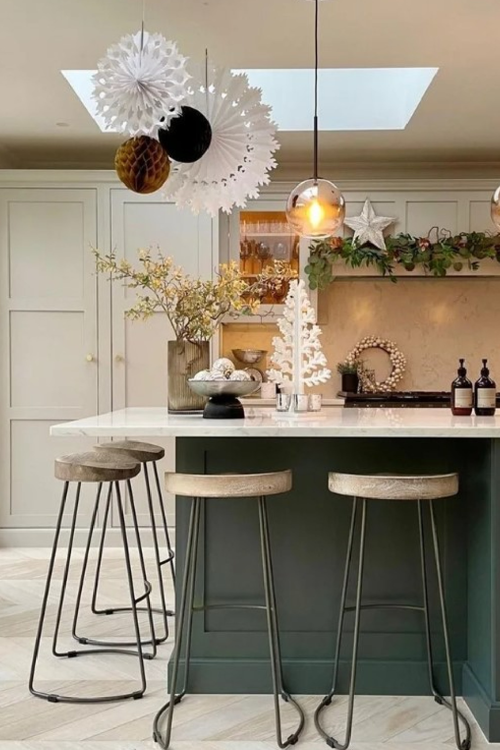 Pavilion Gray (Farrow & Ball) paint color on kitchen cabinets in a beautiful holiday decorated kitchen by @my_midcenturymakeover. #paviliongray