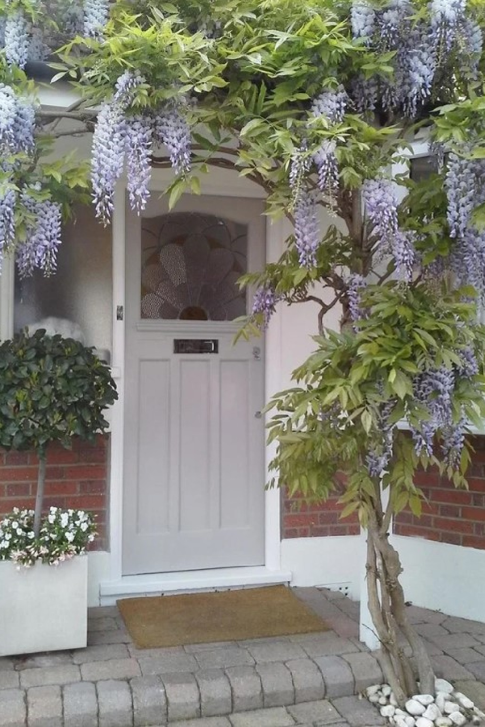 Beautiful front door painted Pavilion Gray by Farrow & Ball - @Tina. #paviliongray