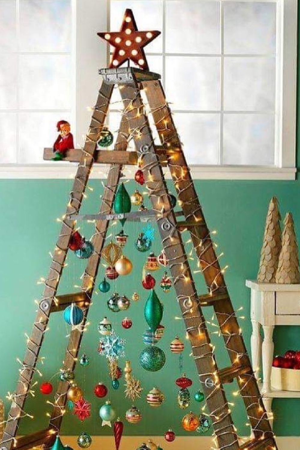 Christmas tree ladder idea for an alternative tree - @adolfson_interior. #laddertree #christmastreeladder #alternativechristmastree