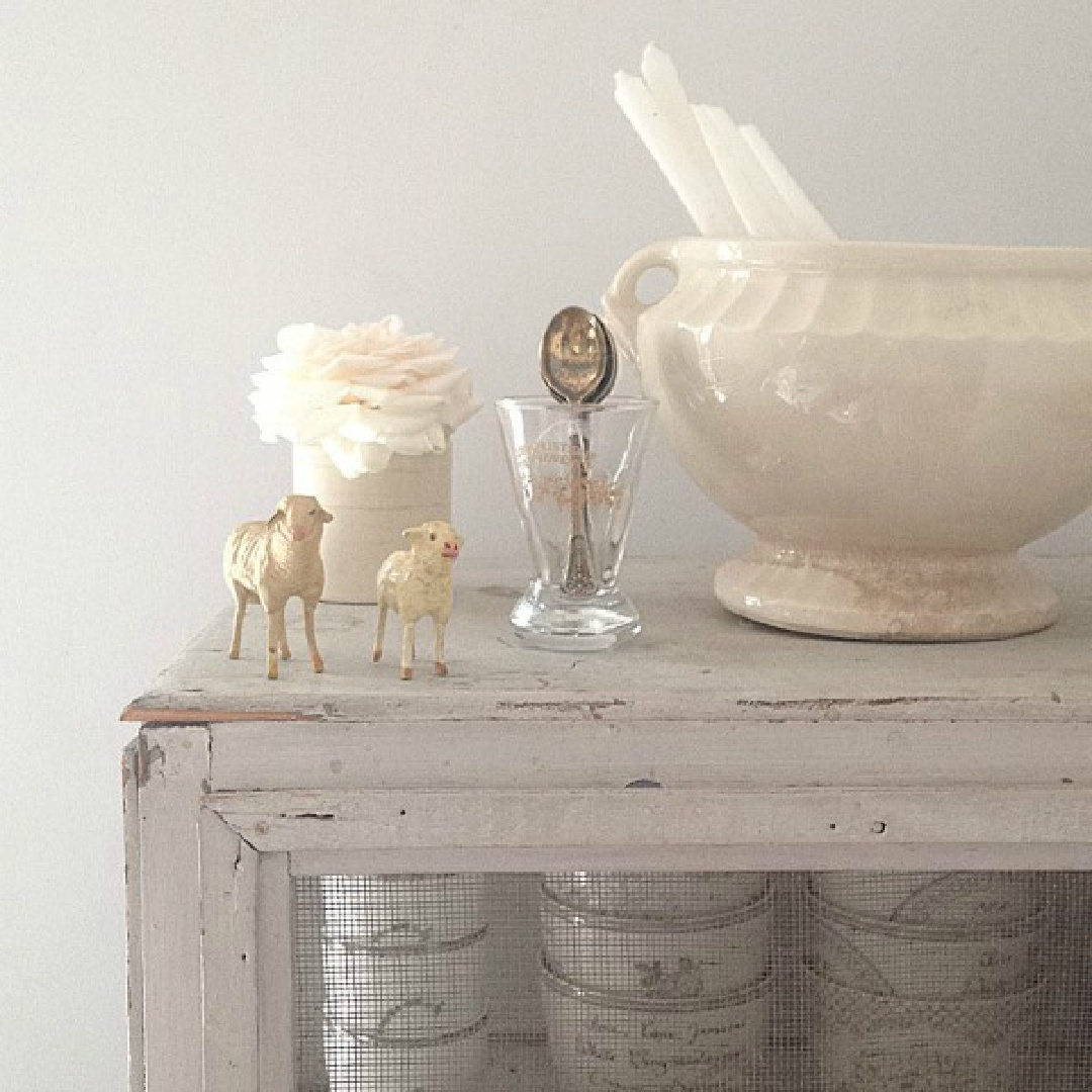 Sweet little vintage sheep on a country cupboard in a Christmas vignette in a French Nordic cottage by My Petite Maison.