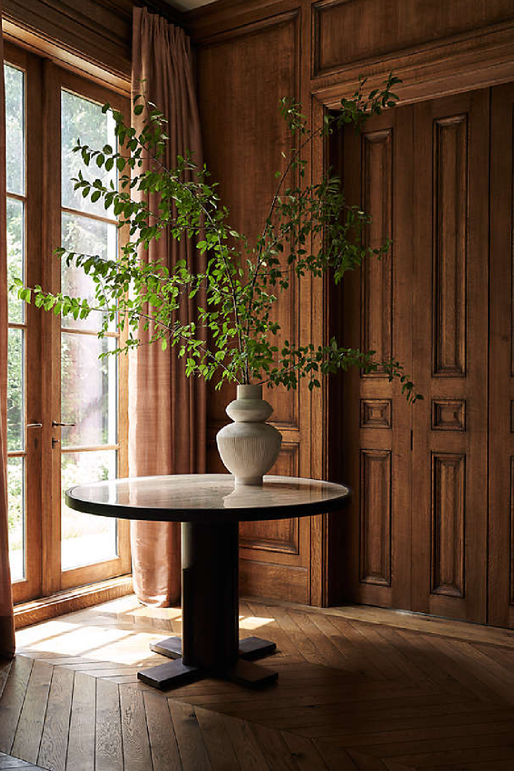 Unica round dining table by Athena Calderone for Crate & Barrel.