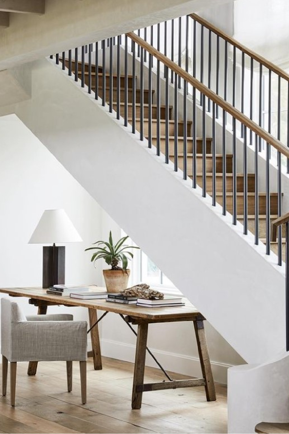 Betsy Brown designed staircase and desk workspace beneath.