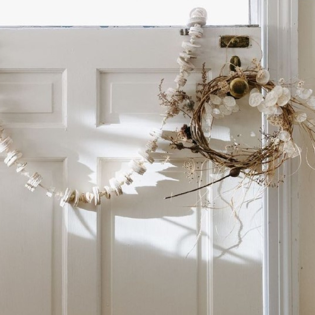 White and rustic Christmas decor at Leanne Ford's own home. #christmasdecor #modernrustic