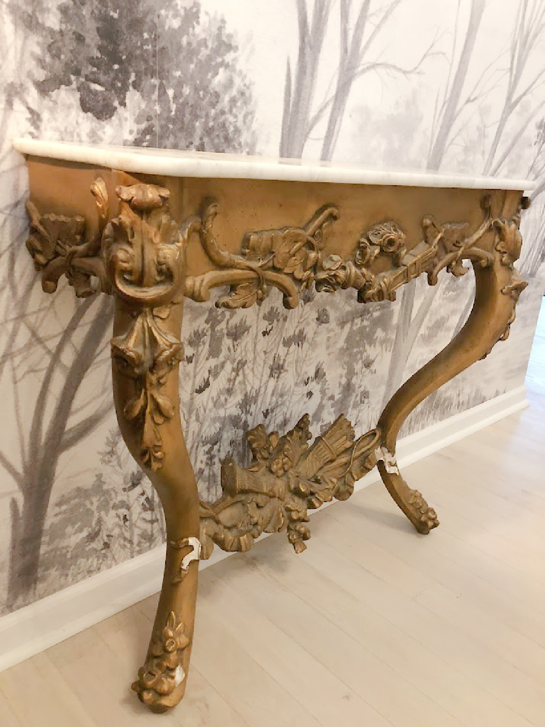 Antique Louis style console from France in our entry with tree scenic wall mural from Photowall - Hello Lovely Studio.