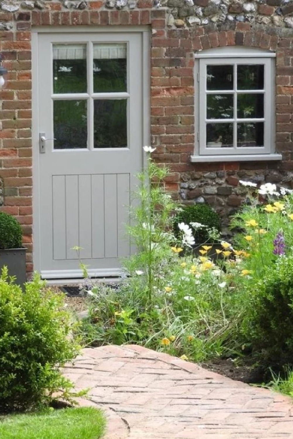 Beautiful Norfolk cottage with door painted Farrow & Ball Hardwick White - @roomswithaview. #hardwickwhite