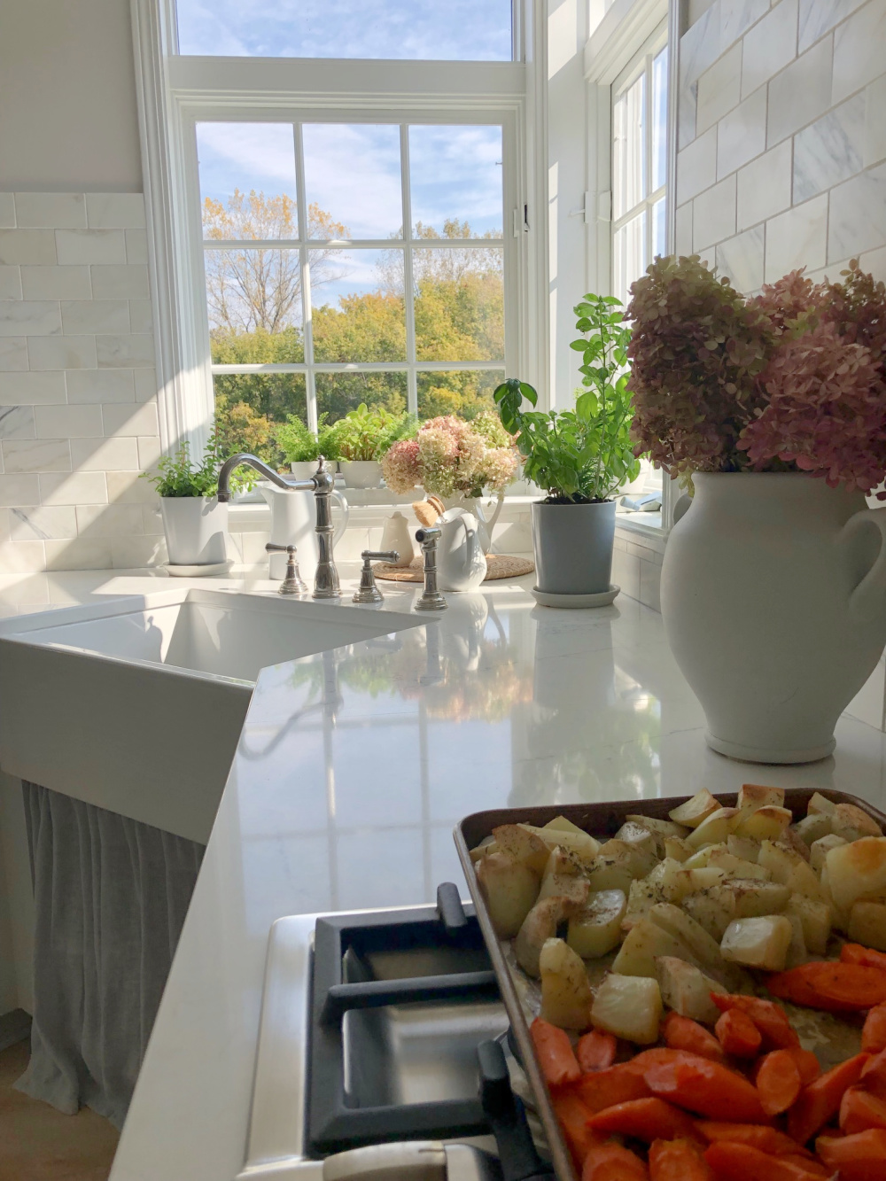 My kitchen in fall with roasted veges on the cooktop - Hello Lovely Studio.