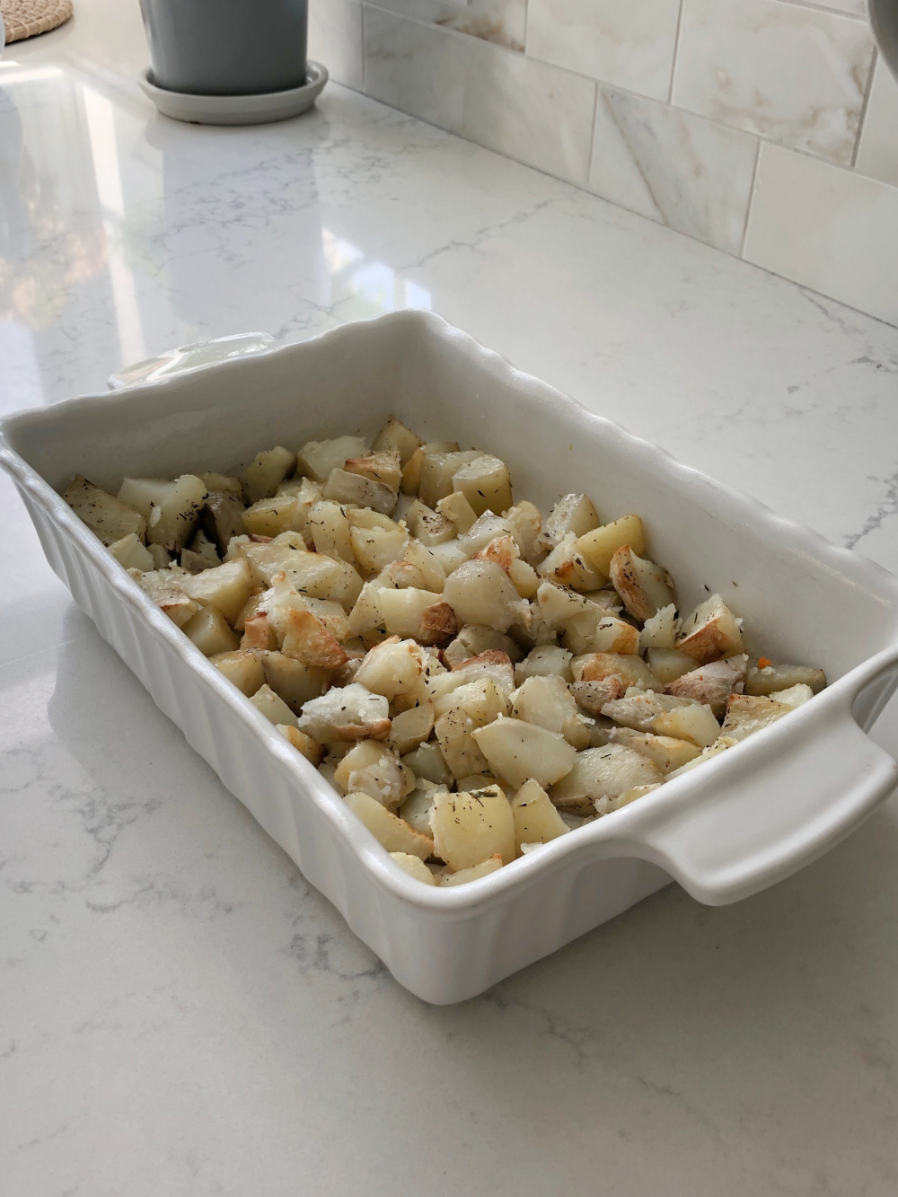 Roasted potatoes in kitchen - Hello Lovely Studio.