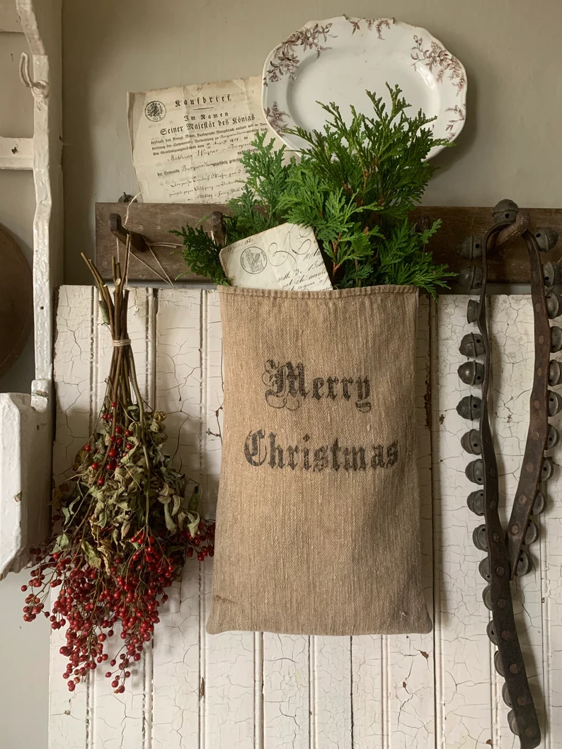 1800s grainsack Christmas pocket from 1871 farmhouse on Etsy. #christmasdecor #frenchchristmas #farmhousechristmas