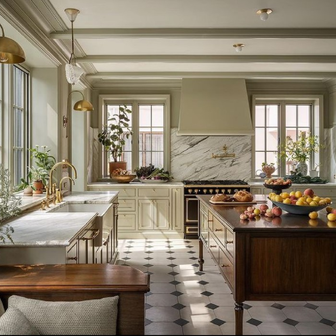 Farrow and Ball French Gray painted walls and kitchen cabinets in a classic traditional luxurious kitchen designed by Jessica Helverson Interiors.
