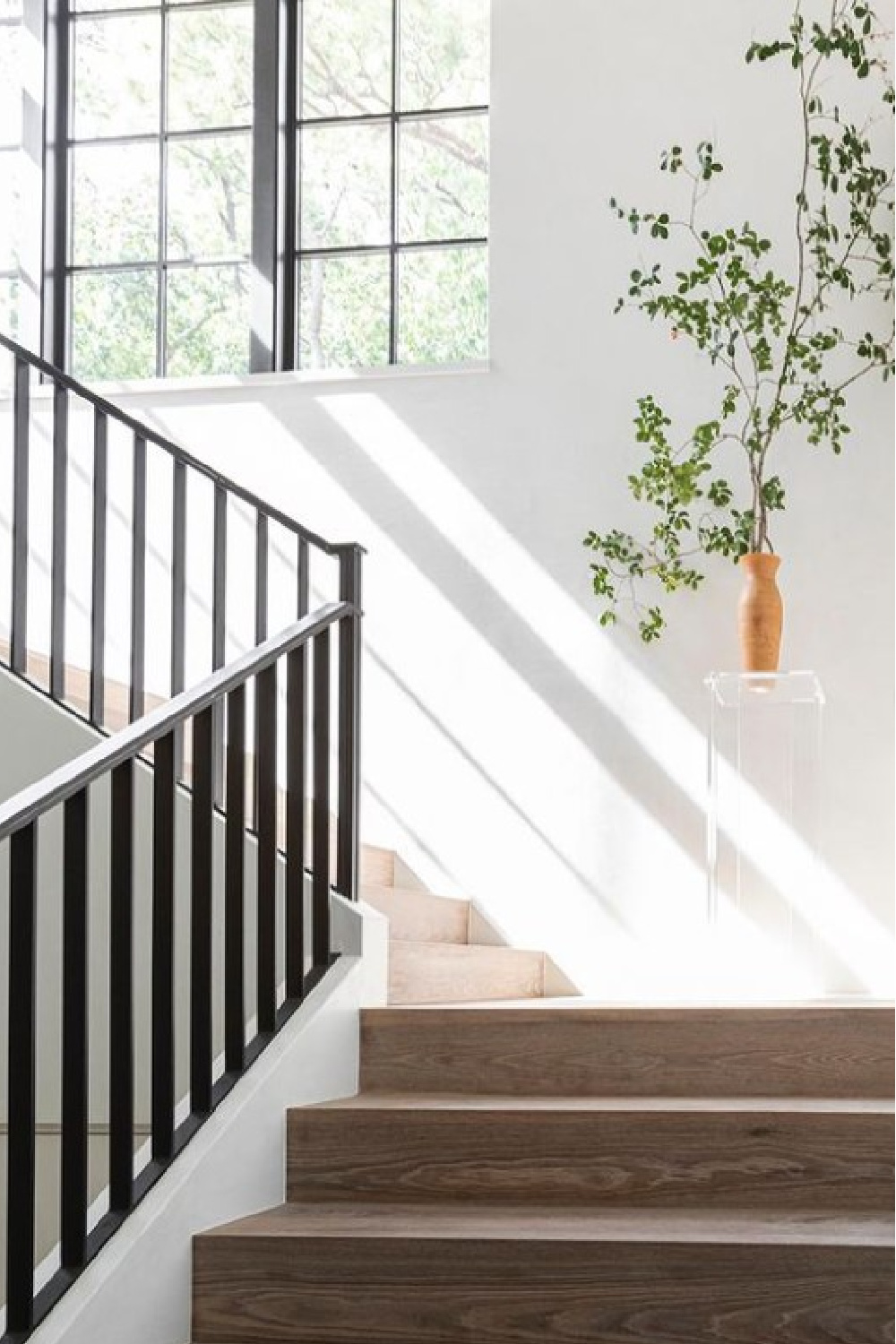 Beautiful serene staircase with architecture by Reagan Andre.
