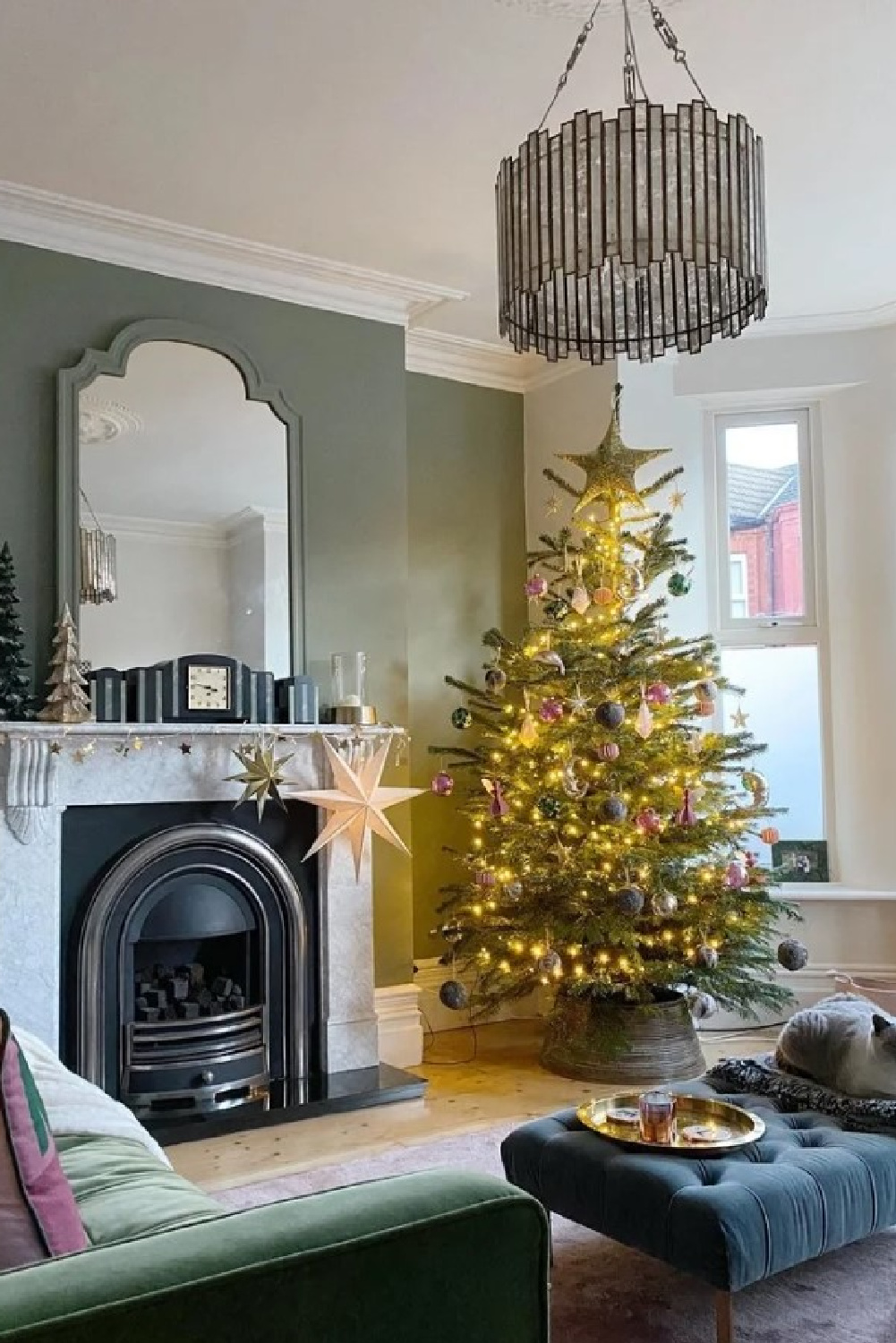 Farrow & Ball Strong White and Card Room Green in an English country living room with Christmas tree - @prettylittleterrace. #strongwhite #cardroomgreen