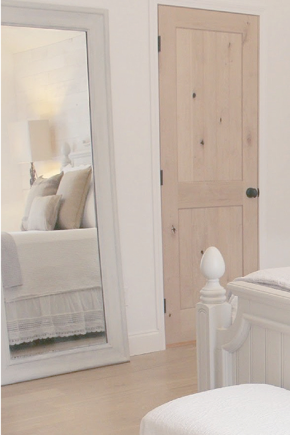 Rustic knotty alder doors and bright white walls in our serene bedroom with romantic European country style - Hello Lovely Studio. #europeancountry #alderdoors #serenebedroom