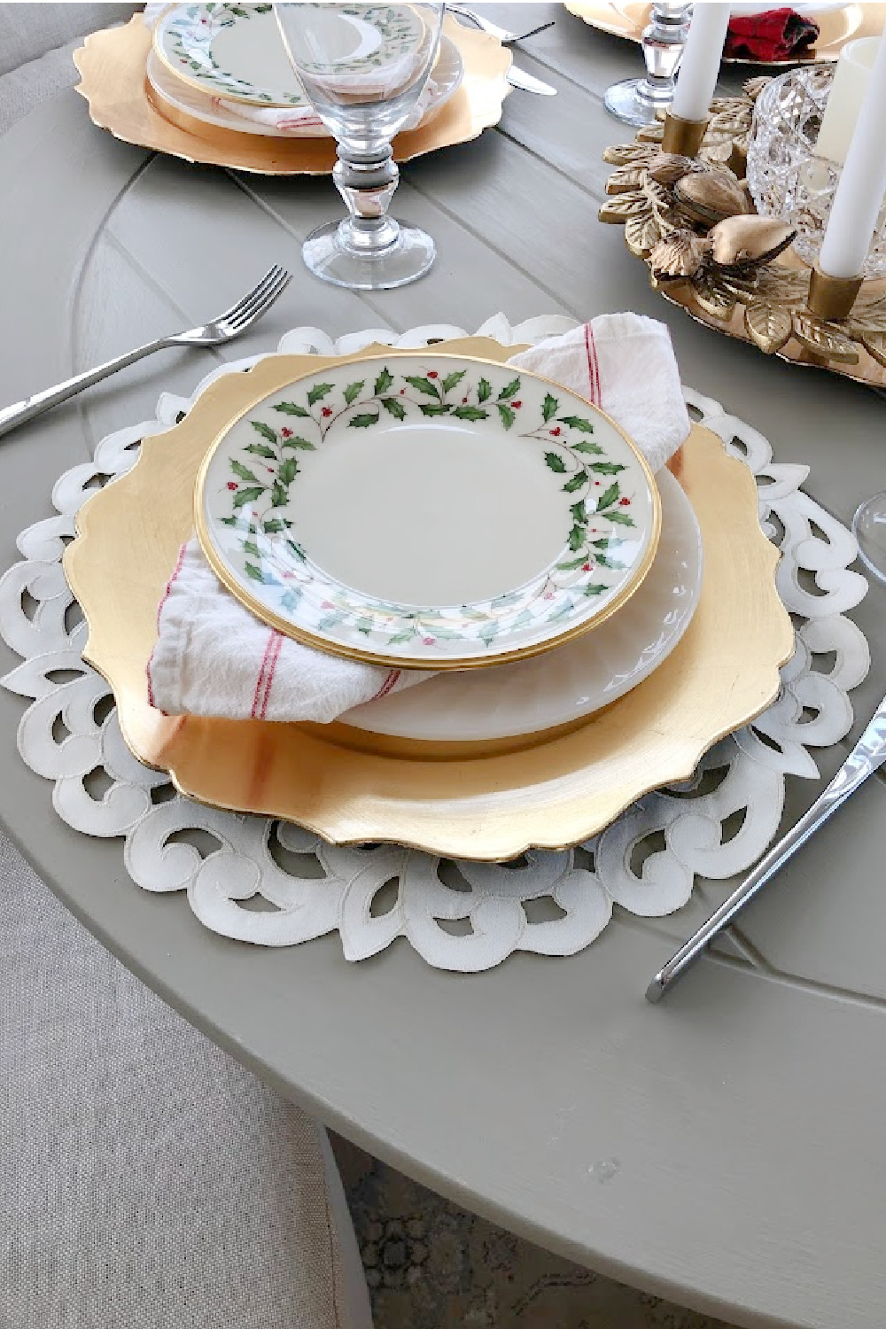 Lenox Holiday china, gold charger and scalloped placemat on our Thanksgiving table - Hello Lovely Studio. #lenox #holidaychina #hollypattern