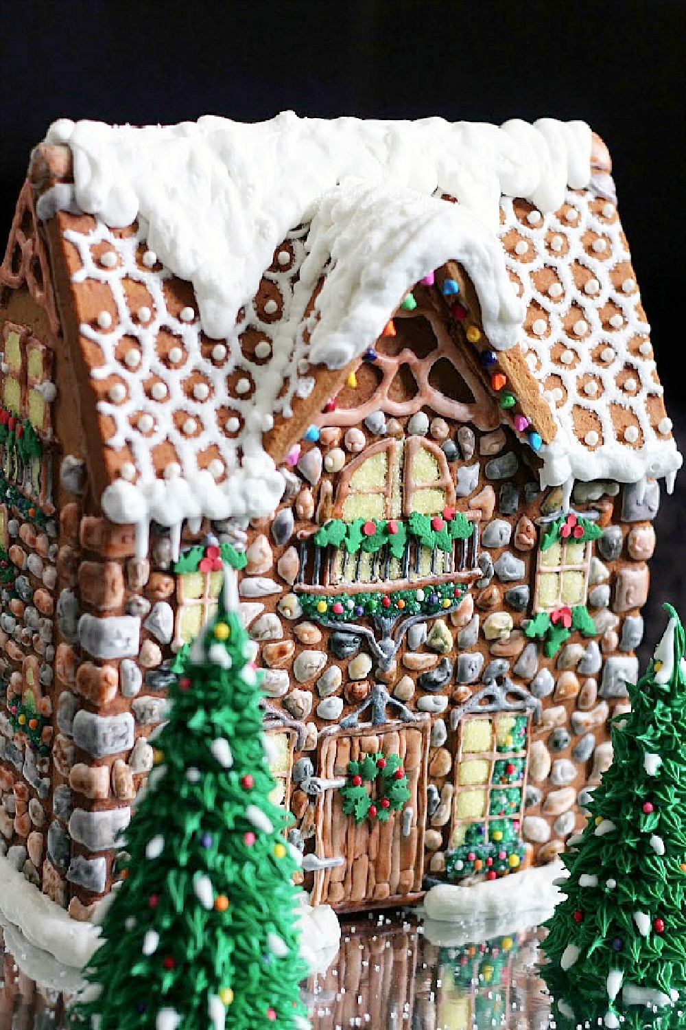 Fantasy gingerbread house studded with candies.