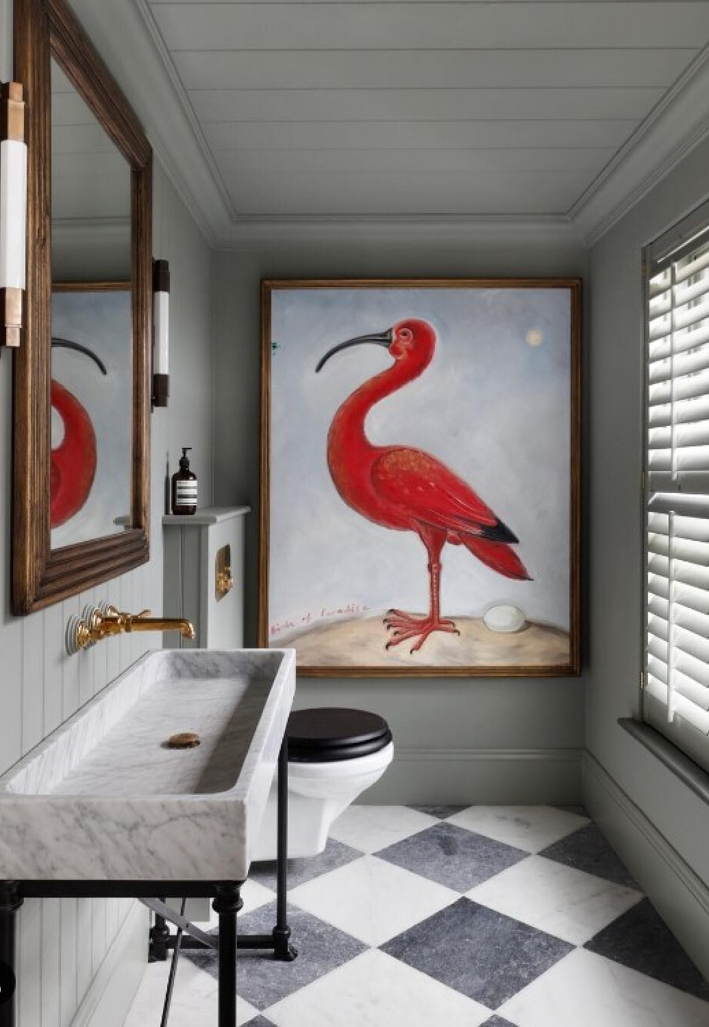 Whimsical, elegant, classic bath with checkered floors and stone sink - TomHouseProperty. #checkeredfloors