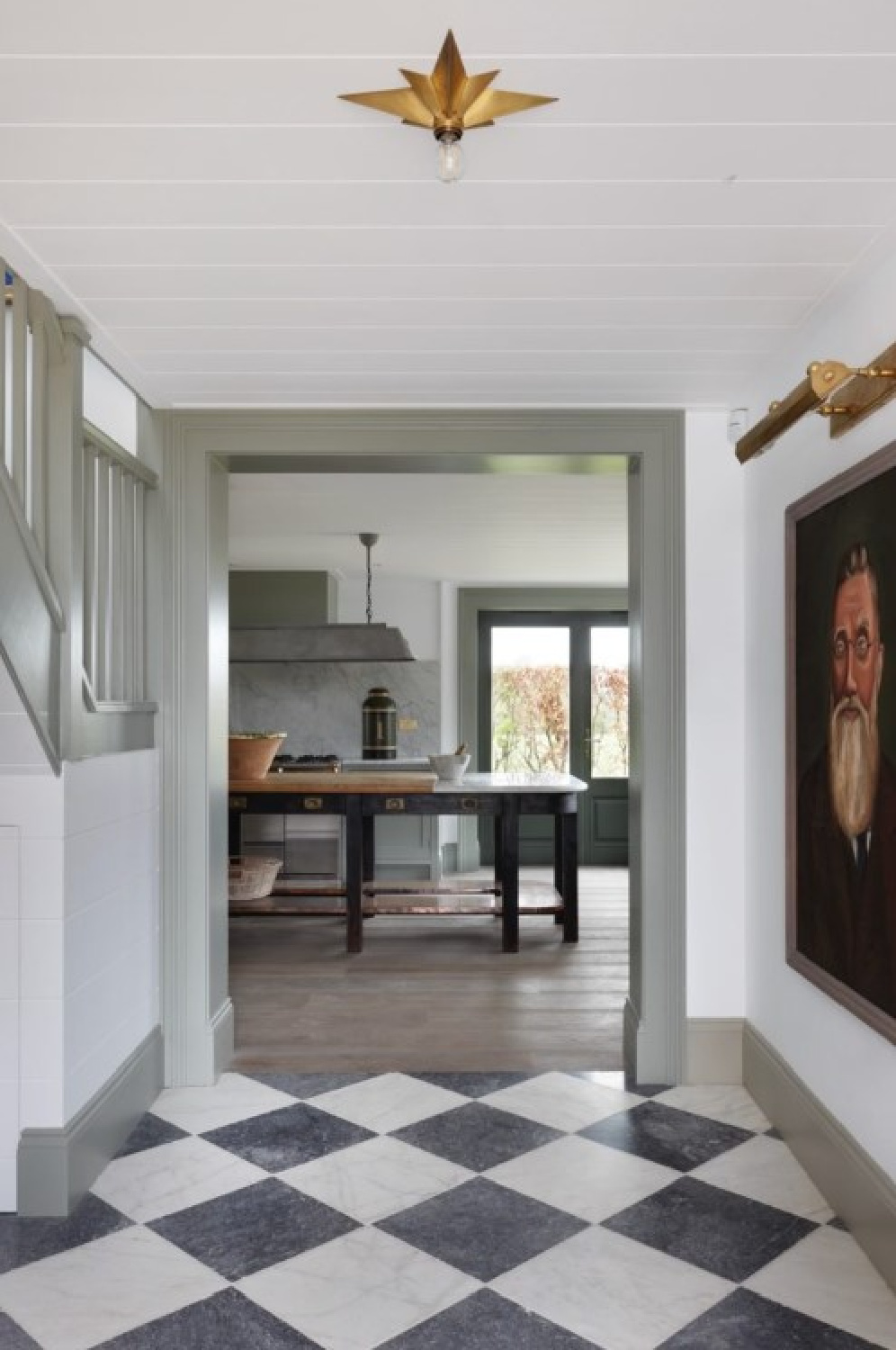 Checkered marble black and white floors in a hall near kitchen - design by @tomhouseproperty. #checkeredfloors