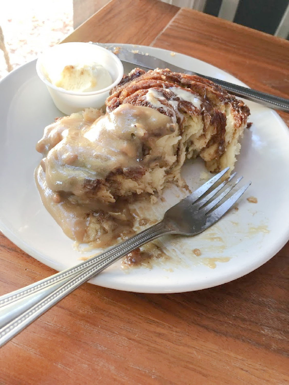 Franklin, TN Biscuit Love's The B-Roll - a biscuit cinnamon roll with pecan sticky bun sauce and cream cheese icing.