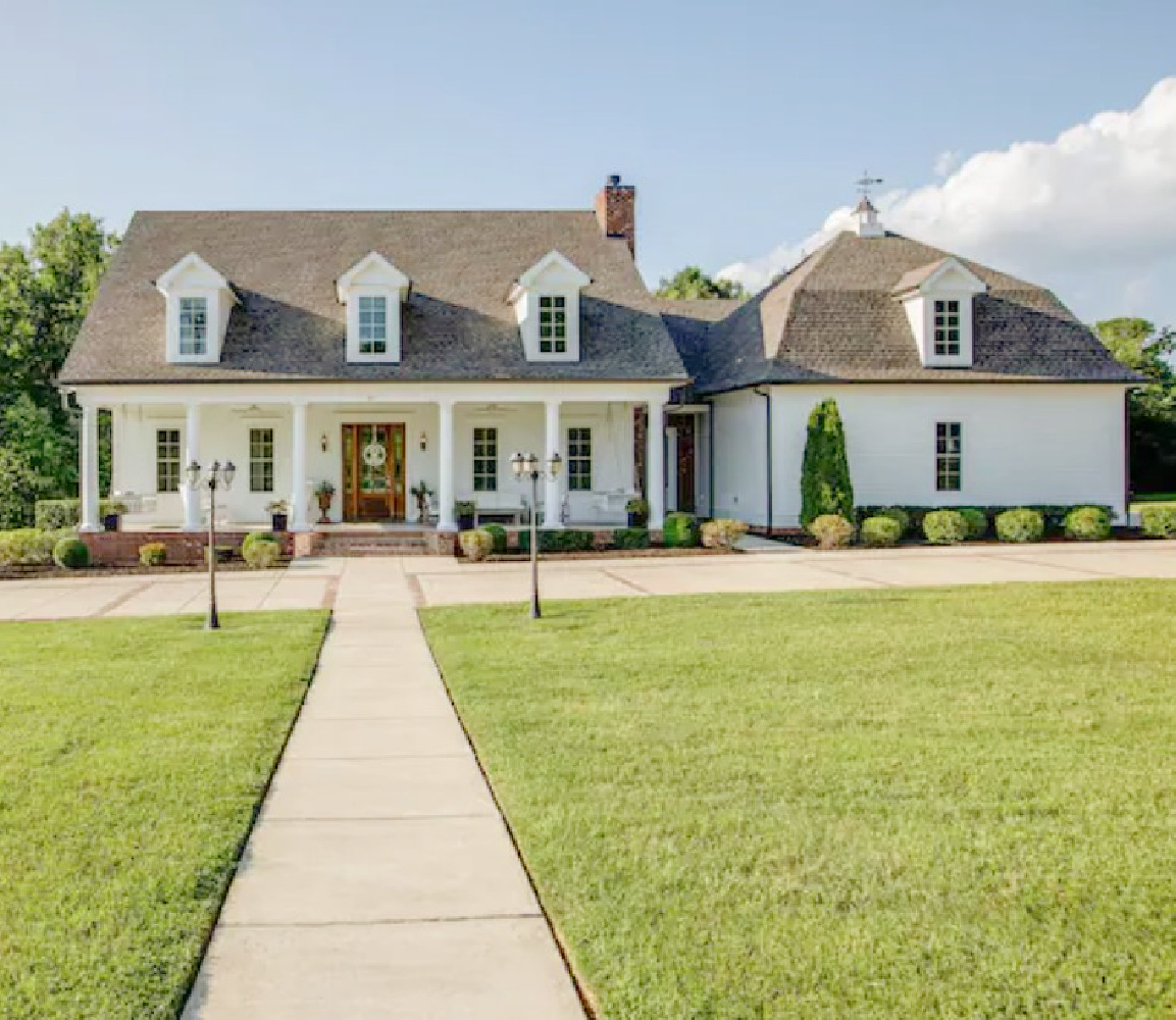 White traditional Southern cottage style home with wide front porch and dormers - Franklin, TN - Hello Lovely Studio.