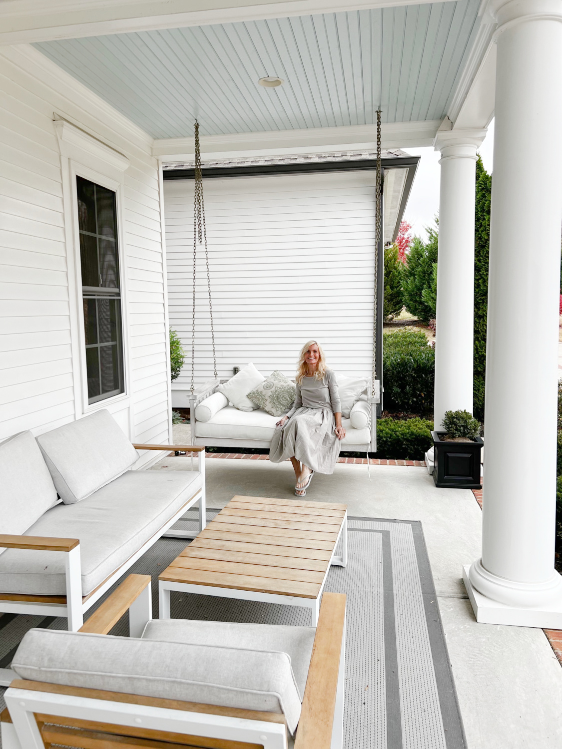 Michele on a Southern porch swing in Franklin, TN - Hello Lovely Studio.