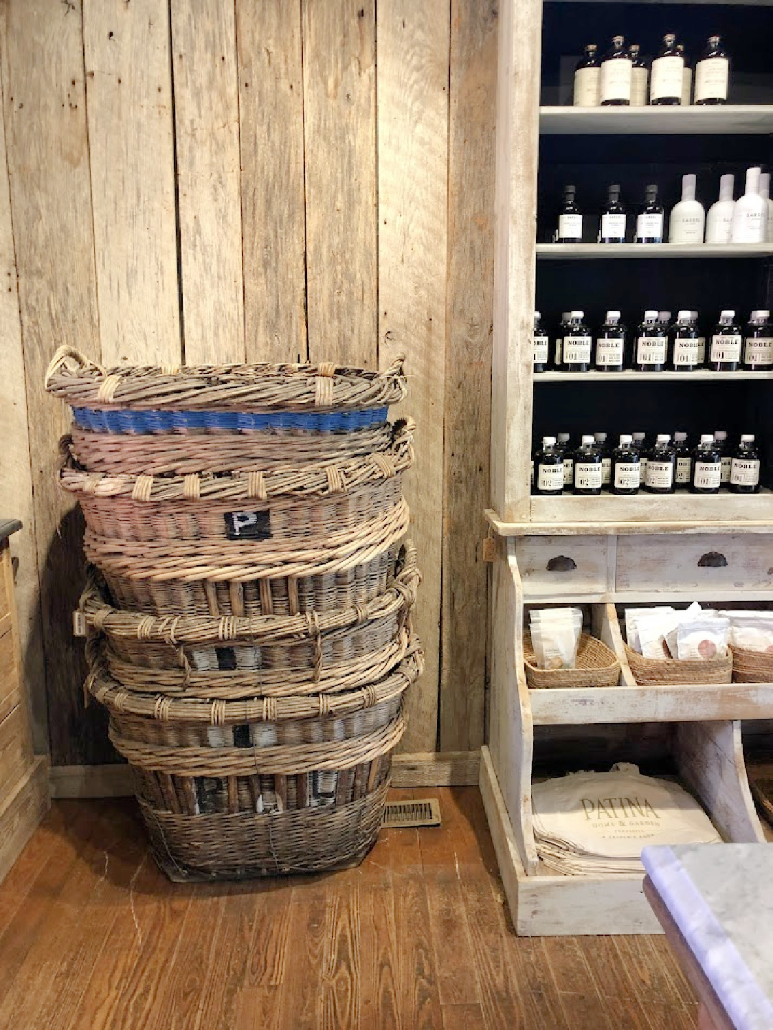 Antique French baskets in Patina Home & Garden shop from Giannettis in Leiper's Fork, TN - Hello Lovely Studio. #patinahome #leipersforktn