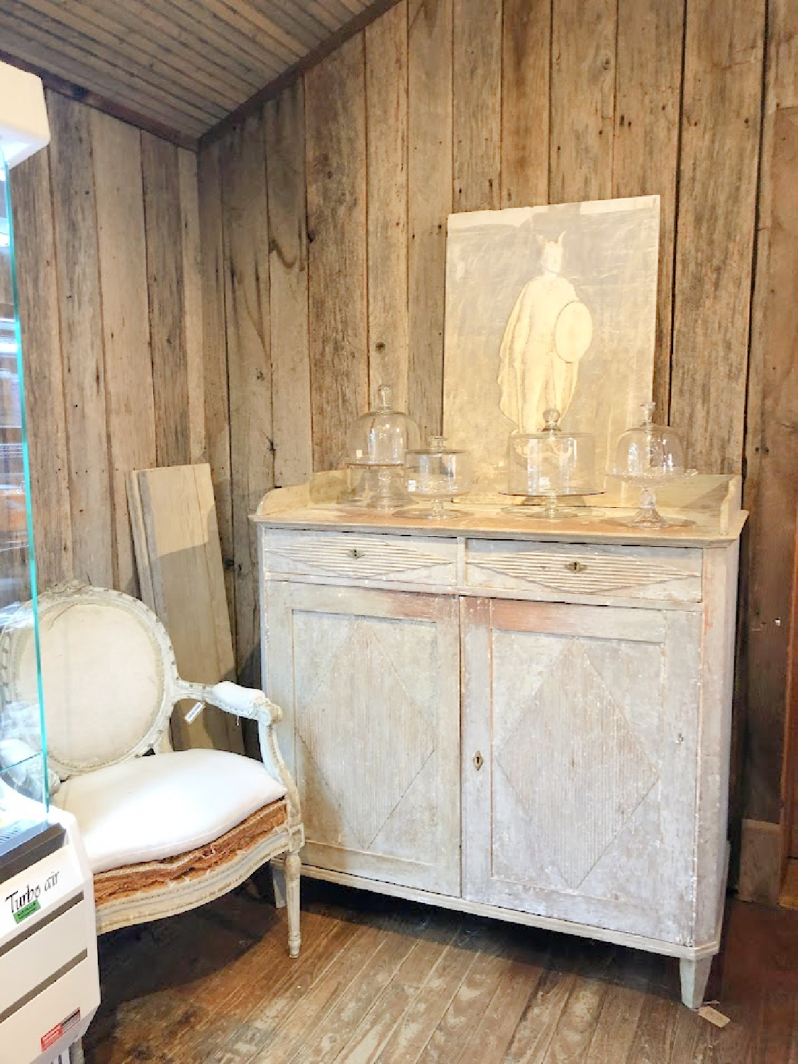 Antique Swedish painted cupboard and French armchair - Patina Home & Garden shop from Giannettis in Leiper's Fork, TN - Hello Lovely Studio. #patinahome #leipersforktn