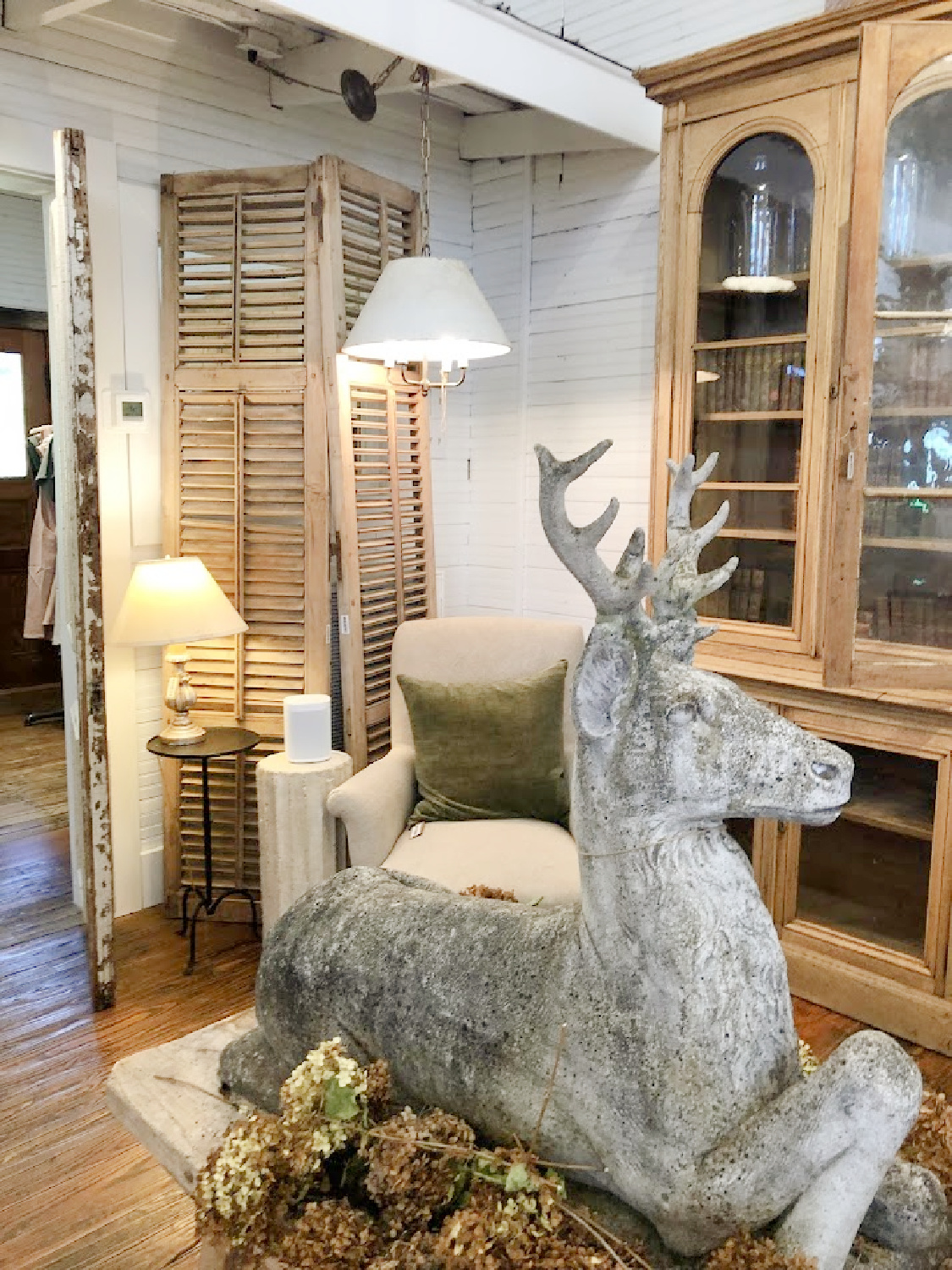 Deer, antiques, shutters, and home goods in Patina Home & Garden shop from Giannettis in Leiper's Fork, TN - Hello Lovely Studio. #patinahome #leipersforktn