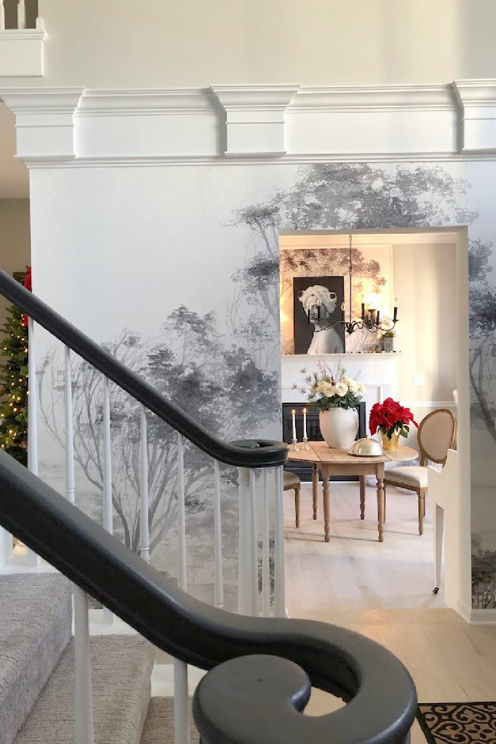 Entry, staircase and dining room in our Georgian. The wallpaper mural is by Photowall.