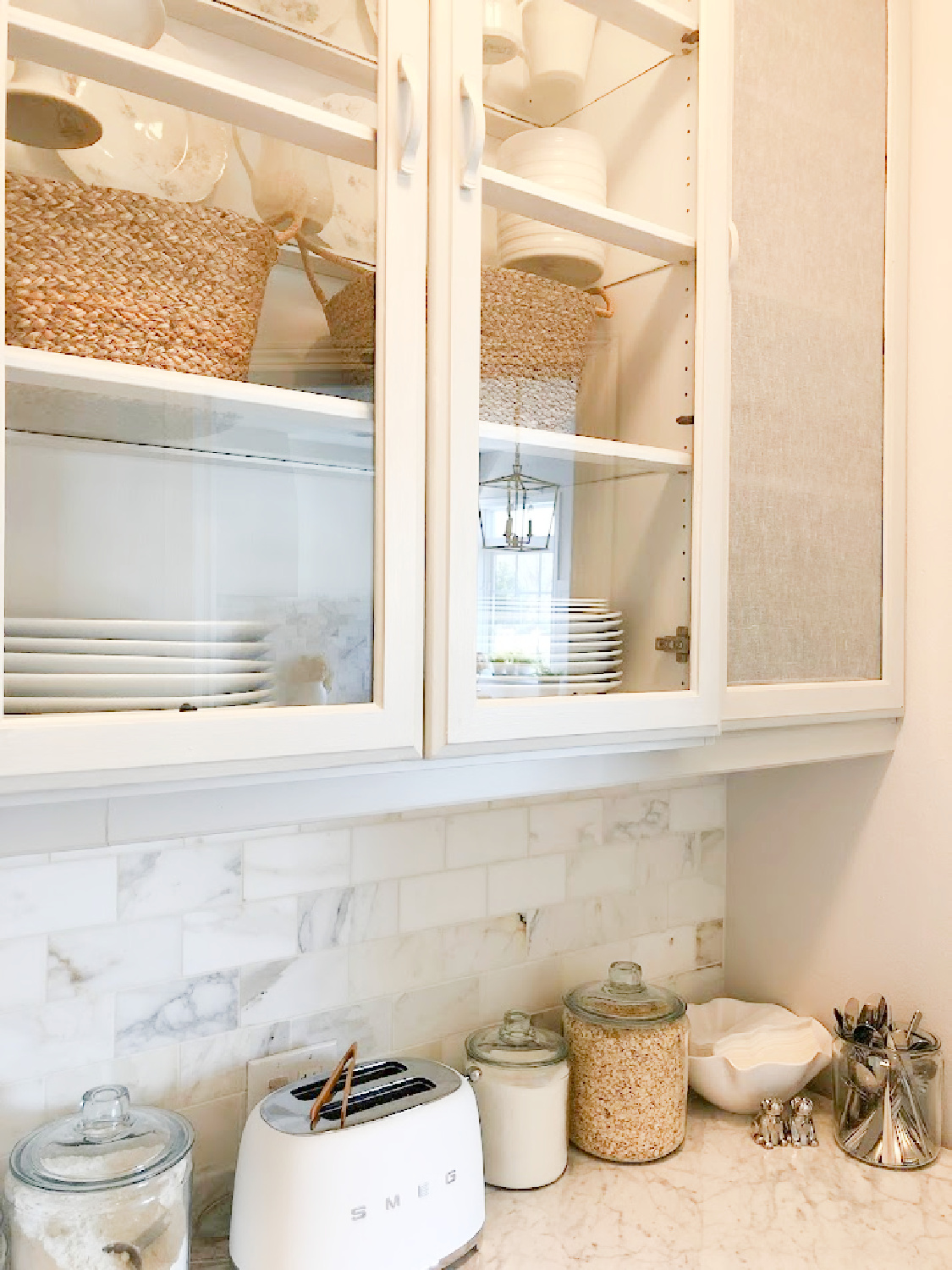 Renovated pantry with light grey cabinets (50% Farrow and Ball Pavilion Gray) and calacatta gold marble backsplash - Hello Lovely Studio.