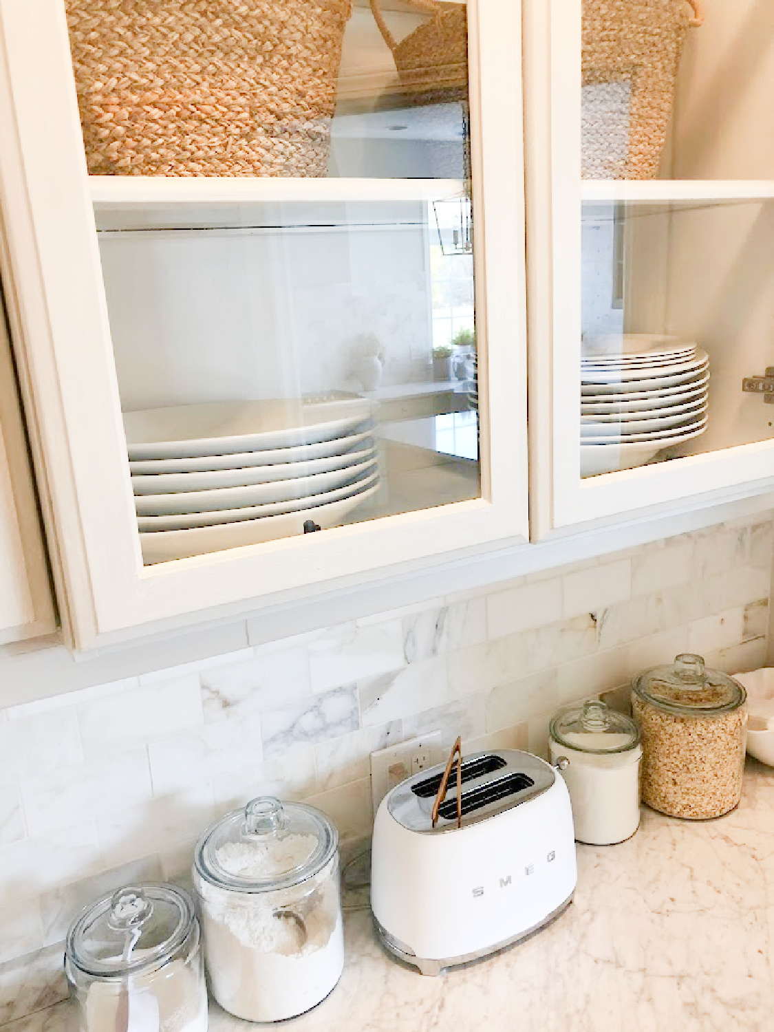 Renovated pantry with light grey cabinets (50% Farrow and Ball Pavilion Gray) and calacatta gold marble backsplash - Hello Lovely Studio.