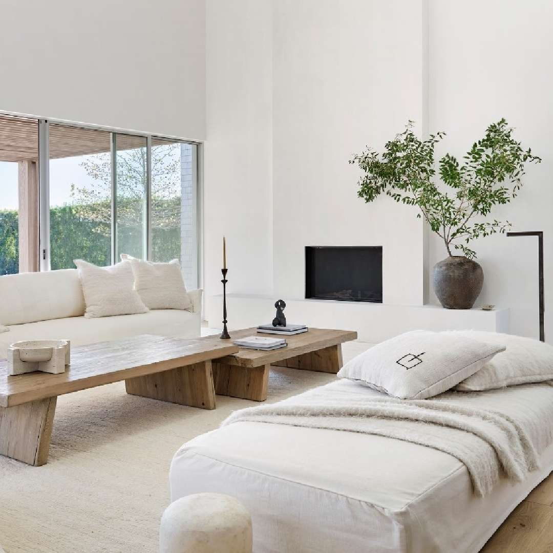 Michael Del Piero designed neutral minimal modern rustic luxe space with fireplace.