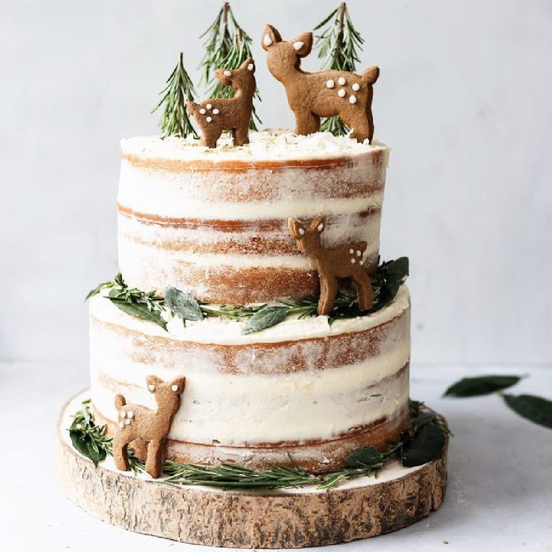 Naked layer Christmas cake with deer on a rustic wood slice - FullCravings on Tumblr. #christmascake #nakedcake #cozychristmas #rusticchristmas