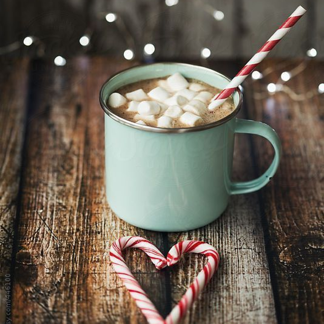 Cozy Christmas mug of hot cocoa with marshmallows, red and white stripe straw and candy canes - Happy Wife Life on Tumblr. #cozychristmas #hotcocoa #wintervibes
